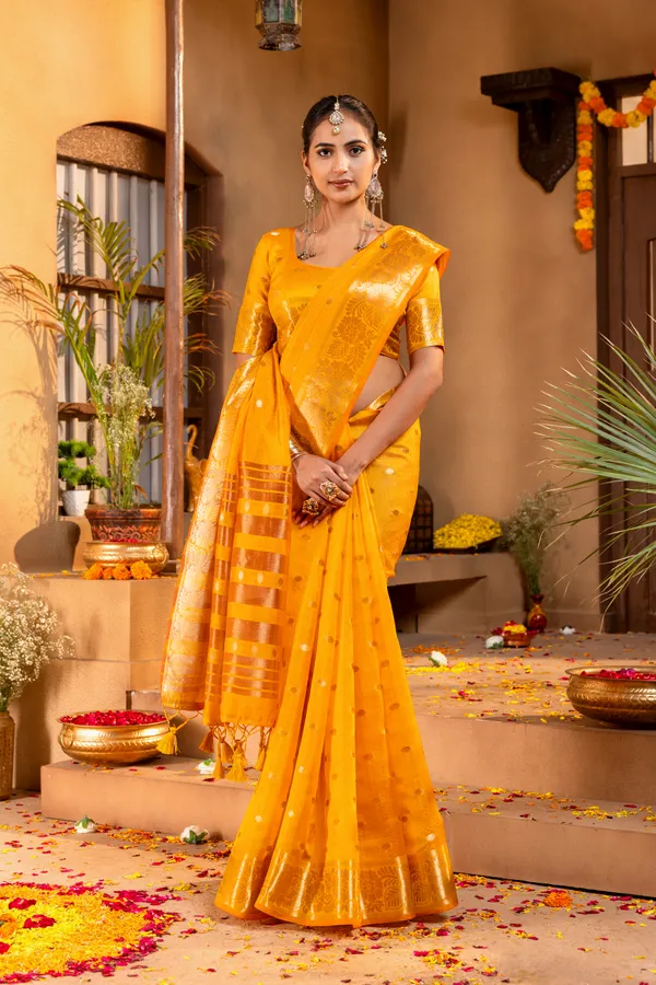 Premium_Soft_Khadi_Shimmer_sarees_with_Beautiful_Butti_Design_Weaving__Pallu_With_Attractive_Traditional_Zari_Weaving__Border_With_All_Over_Butti_Weaving__Design_And_Butti_Design_Weaving__Blouse_With_Fancy_Tassels