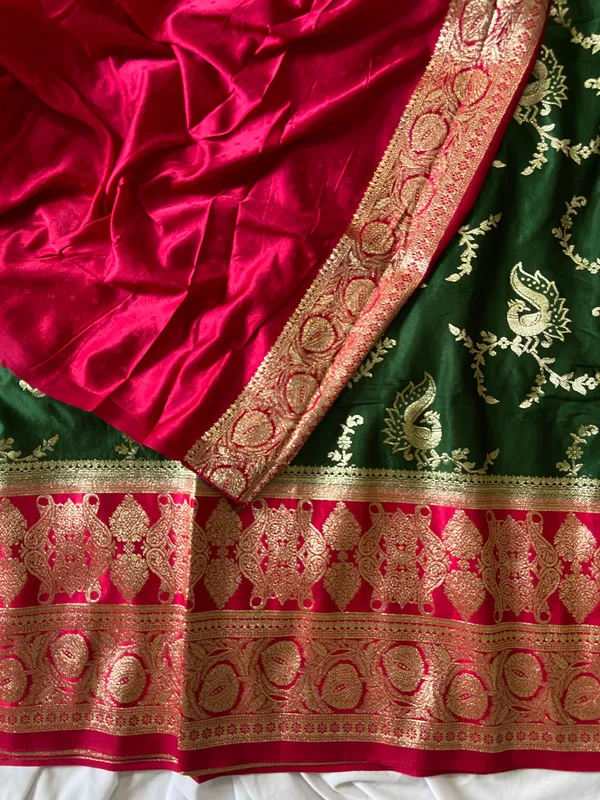 Banarasi_Pure_Satin_Silk_sarees_with_Beautiful_Peacock_in_Contrast_Pink-Green_Shades_With_Attractive_Weaving_Gold_Zari_Design_And_Contrast_Blouse_With_Tassels