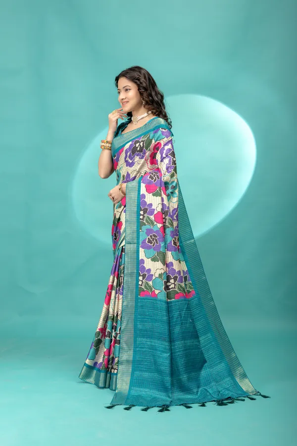 Soft_Tussar_Silk_sarees_with_Beautiful_Style_Of_Floral_Digital_Print_With_Attractive_Border_And_Contrast_Print_Blouse_With_Tassels