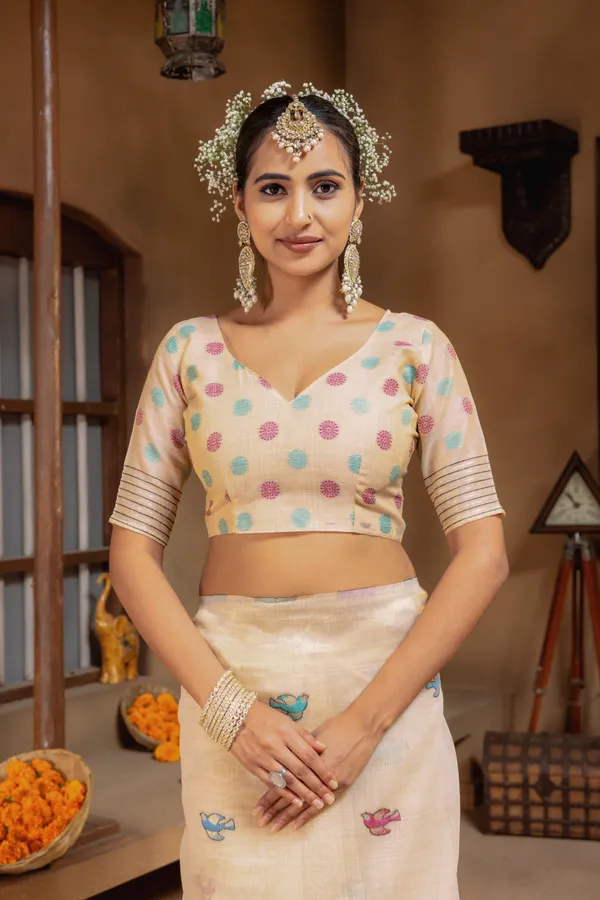 Premium_Soft_Muga_Cotton_sarees_with_Beautiful_Colourfull_Resham_Weaving_Pallu_With_Attractive_Traditional_Zari_Weaving_Border_With_All_Over_Resham_Weaving_Birds_Design_And_Resham_Weaving_Butti_Blouse_With_Fancy_Tassels