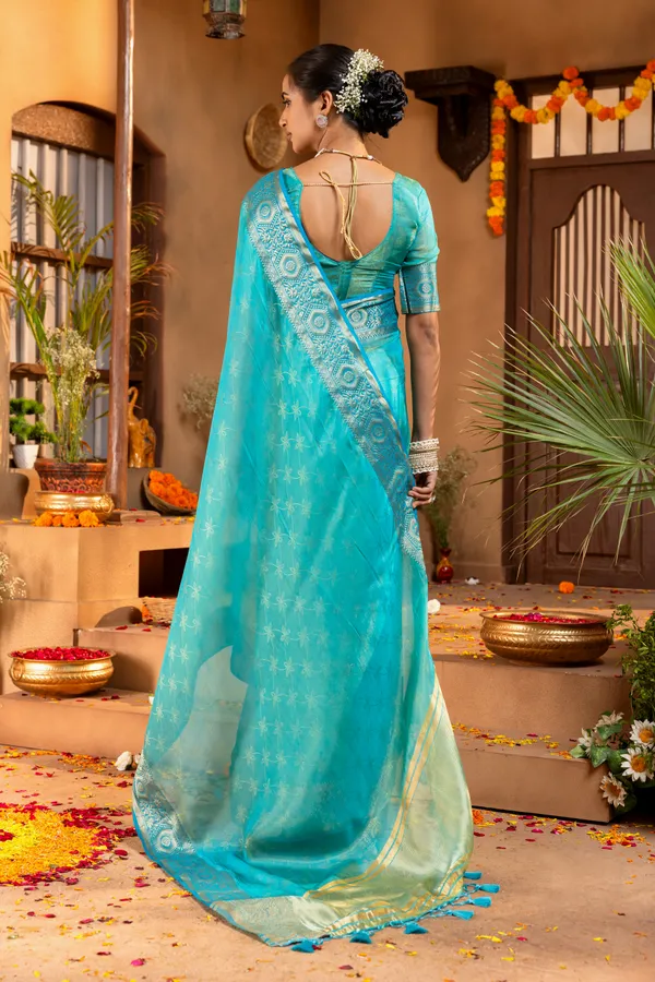 Premium_Soft_Fandy_Satin_sarees_with_Beautiful_Self_Design_Weaving__Pallu_With_Attractive_Traditional_Zari_Weaving__Border_With_All_Over_Self_Weaving__Design_And_Self_Design_Weaving__Blouse_With_Fancy_Tassels