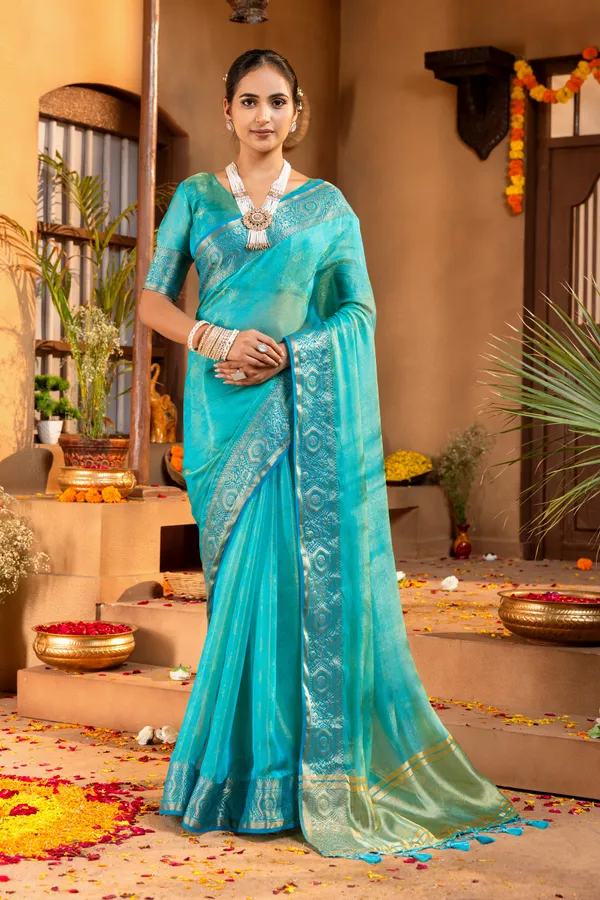 Premium_Soft_Fandy_Satin_sarees_with_Beautiful_Self_Design_Weaving__Pallu_With_Attractive_Traditional_Zari_Weaving__Border_With_All_Over_Self_Weaving__Design_And_Self_Design_Weaving__Blouse_With_Fancy_Tassels