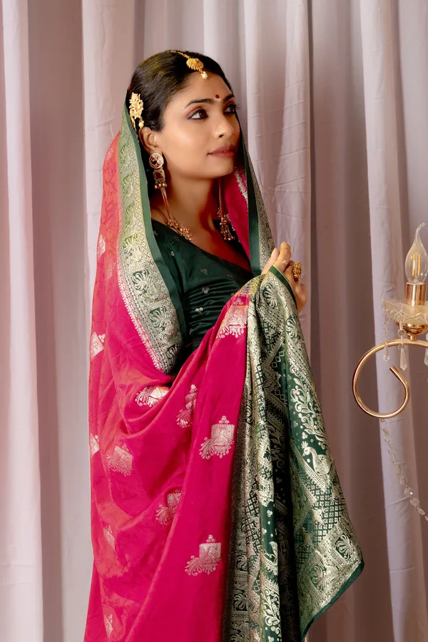 Banarasi_Pure_Satin_Silk_sarees_with_Beautiful_Elephant_in_Contrast_Green-Pink_Shades_With_Attractive_Weaving_Gold_Zari_Design_And_Contrast_Blouse_With_Tassels