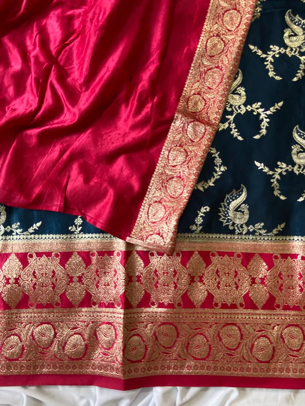 Banarasi_Pure_Satin_Silk_sarees_with_Beautiful_Peacock_in_Contrast_Pink-Blue_Shades_With_Attractive_Weaving_Gold_Zari_Design_And_Contrast_Blouse_With_Tassels