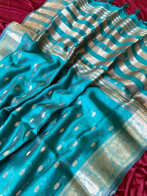 Premium_Soft_Khadi_Shimmer_sarees_with_Beautiful_Butti_Design_Weaving__Pallu_With_Attractive_Traditional_Zari_Weaving__Border_With_All_Over_Butti_Weaving__Design_And_Butti_Design_Weaving__Blouse_With_Fancy_Tassels