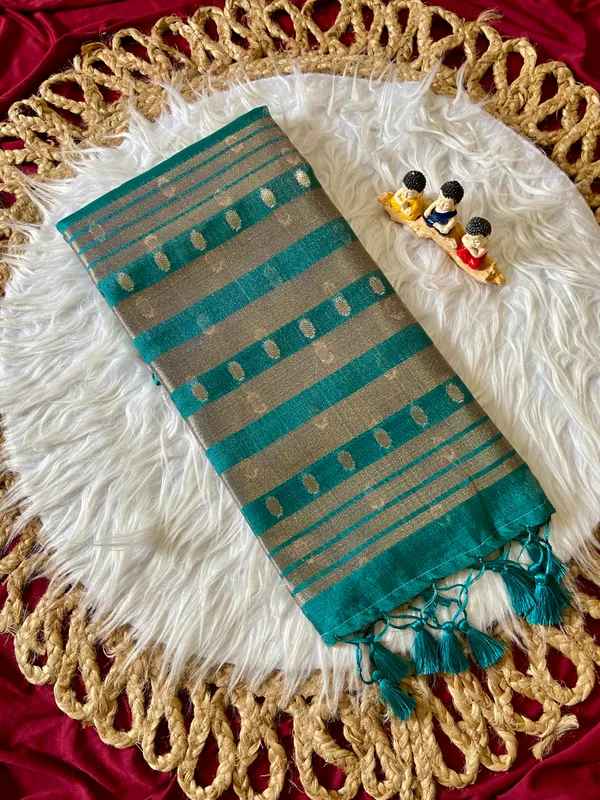 Premium_Soft_Khadi_Shimmer_sarees_with_Beautiful_Butti_Design_Weaving__Pallu_With_Attractive_Traditional_Zari_Weaving__Border_With_All_Over_Butti_Weaving__Design_And_Butti_Design_Weaving__Blouse_With_Fancy_Tassels