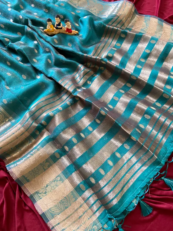 Premium_Soft_Khadi_Shimmer_sarees_with_Beautiful_Butti_Design_Weaving__Pallu_With_Attractive_Traditional_Zari_Weaving__Border_With_All_Over_Butti_Weaving__Design_And_Butti_Design_Weaving__Blouse_With_Fancy_Tassels