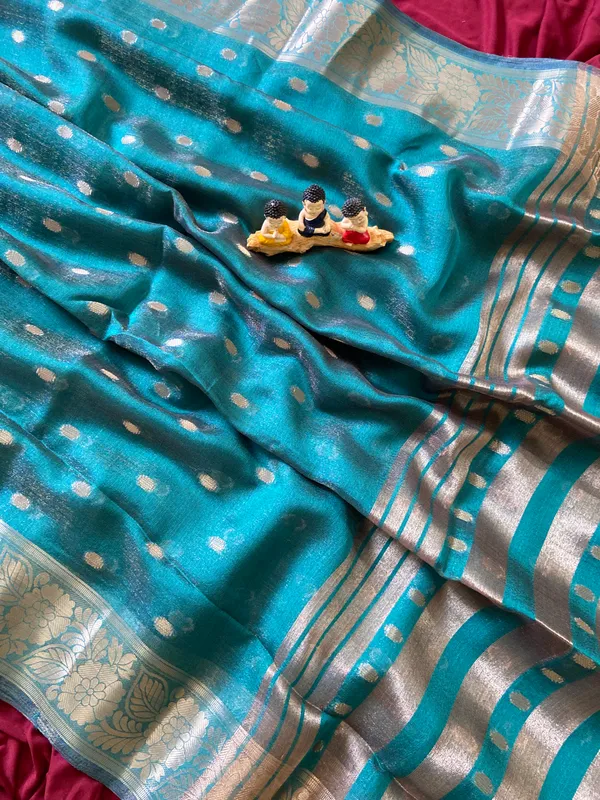 Premium_Soft_Khadi_Shimmer_sarees_with_Beautiful_Butti_Design_Weaving__Pallu_With_Attractive_Traditional_Zari_Weaving__Border_With_All_Over_Butti_Weaving__Design_And_Butti_Design_Weaving__Blouse_With_Fancy_Tassels