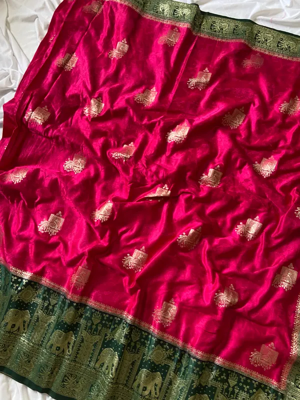 Banarasi_Pure_Satin_Silk_sarees_with_Beautiful_Elephant_in_Contrast_Green-Pink_Shades_With_Attractive_Weaving_Gold_Zari_Design_And_Contrast_Blouse_With_Tassels