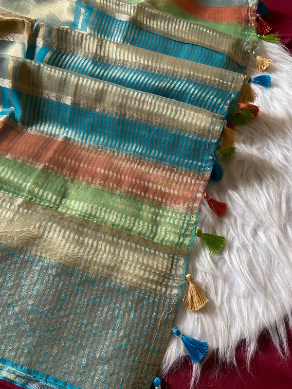 Soft_Tissue_Silk_sarees_with_Beautiful_Weaving_With_Attractive_Design_And_Weaving_Blouse_With_Tassels_in_new_styles_n_new_look