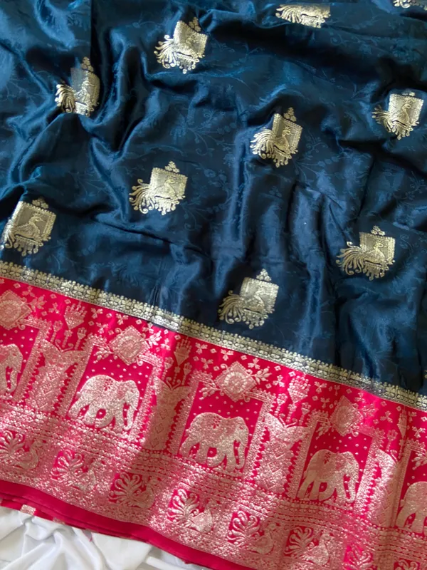 Banarasi_Pure_Satin_Silk_sarees_with_Beautiful_Elephant_in_Contrast_Pink-Blue_Shades_With_Attractive_Weaving_Gold_Zari_Design_And_Contrast_Blouse_With_Tassels