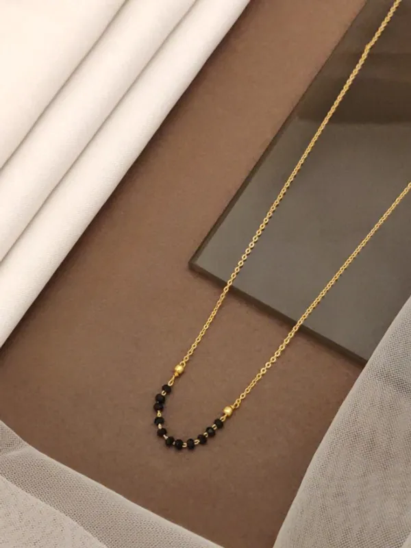 micro_gold_plated_elegant_simple_black_beeds_mangalsutra_with_hand_ms