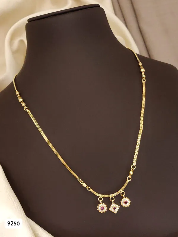 Delicate_Gold_Chain_with_Floral_Ruby_Pendants