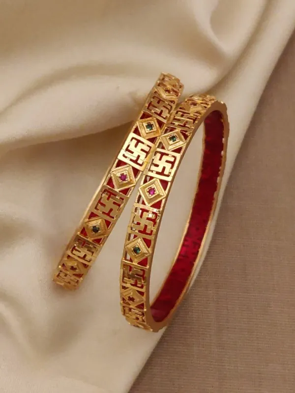 Divine_Swastik_Micro_Gold_Plated_Kundan_Bangles_–_Traditional_Auspicious_Design