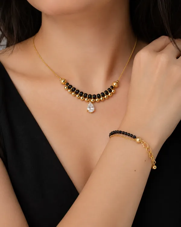 Elegant_Black_Beads_Teardrop_Pendant_Mangalsutra_&_Bracelet_Combo