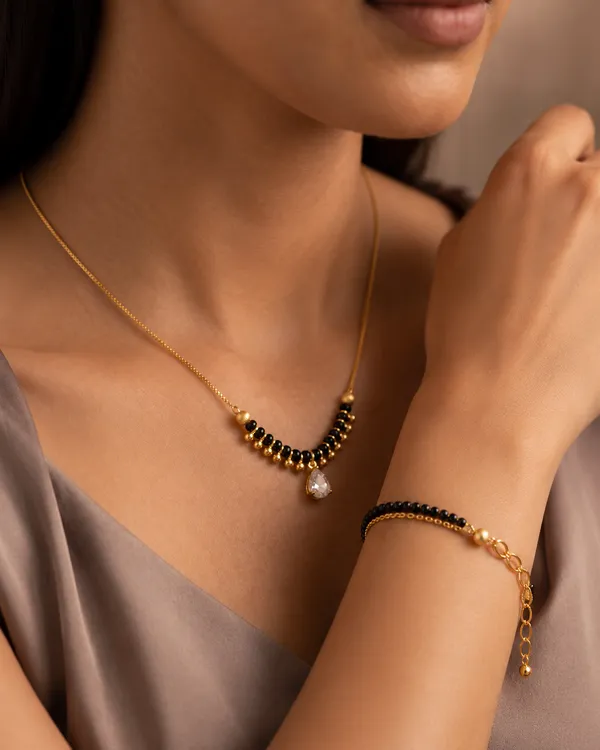 Elegant_Black_Beads_Teardrop_Pendant_Mangalsutra_&_Bracelet_Combo