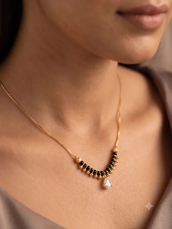 Elegant_Black_Beads_Teardrop_Pendant_Mangalsutra_&_Bracelet_Combo
