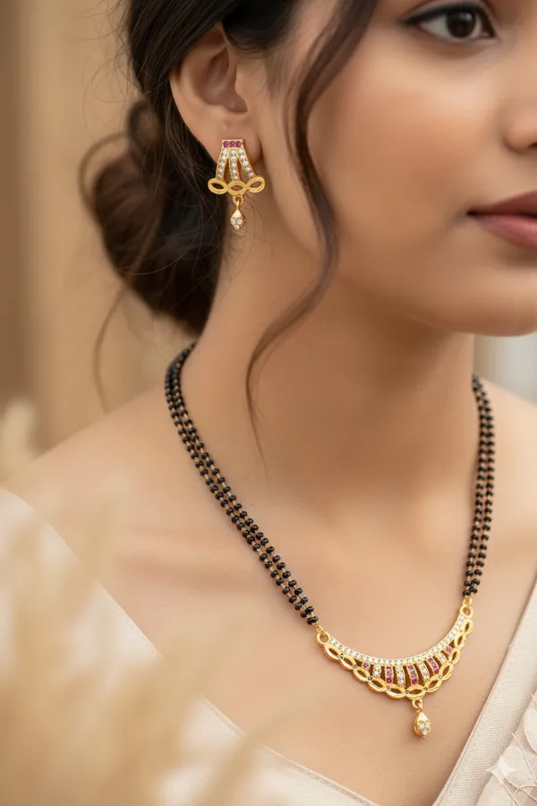Elegant_Curved_AD_Diamond_&_Ruby_Stone_Gold-Plated_24_inches_Mangalsutra_with_earring