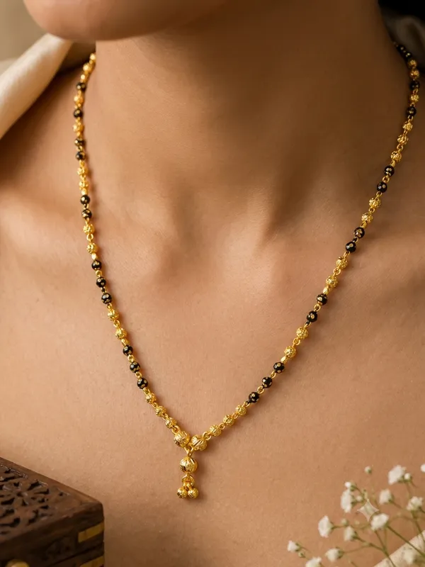 Elegant_Gold_Plated_Black_Beaded_Mangalsutra_with_Traditional_Gold_Bead_Pendant_for_Women