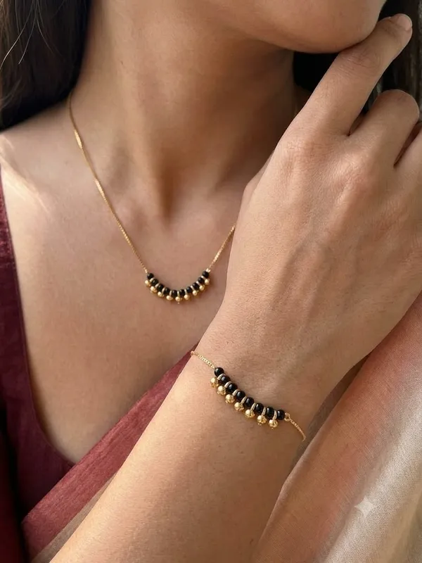 Elegant_Gold_Plated_Black_Beads_Mangalsutra_Set_for_Women_–_Traditional_Daily_Wear_Mangalsutra__Combo