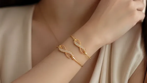 Elegant_Infinity_Twist_Gold_Plated_Diamond_Studded_Adjustable_Bracelet_Pair