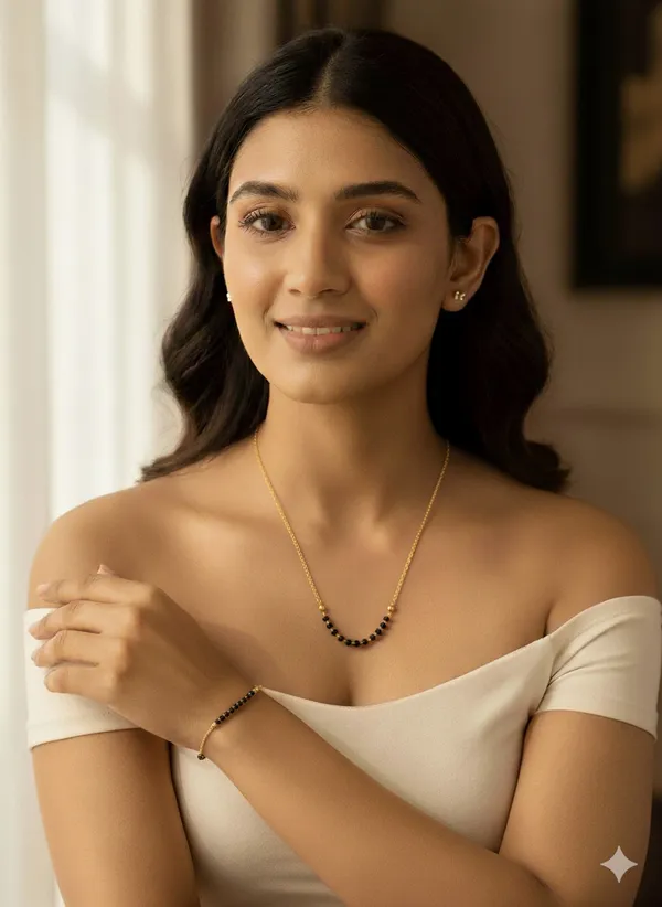Micro_gold_plated_daily_wear_delecate_black_pearl_mangalsutra_with_hand_ms