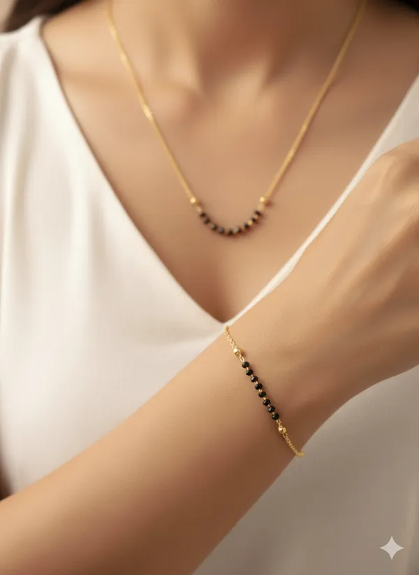 Micro_gold_plated_daily_wear_delecate_black_pearl_mangalsutra_with_hand_ms
