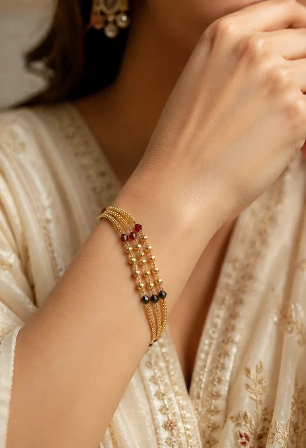 Premium_Gold-Plated_Bhabhi_Rakhi_with_Pearl_&_Ruby_Beads