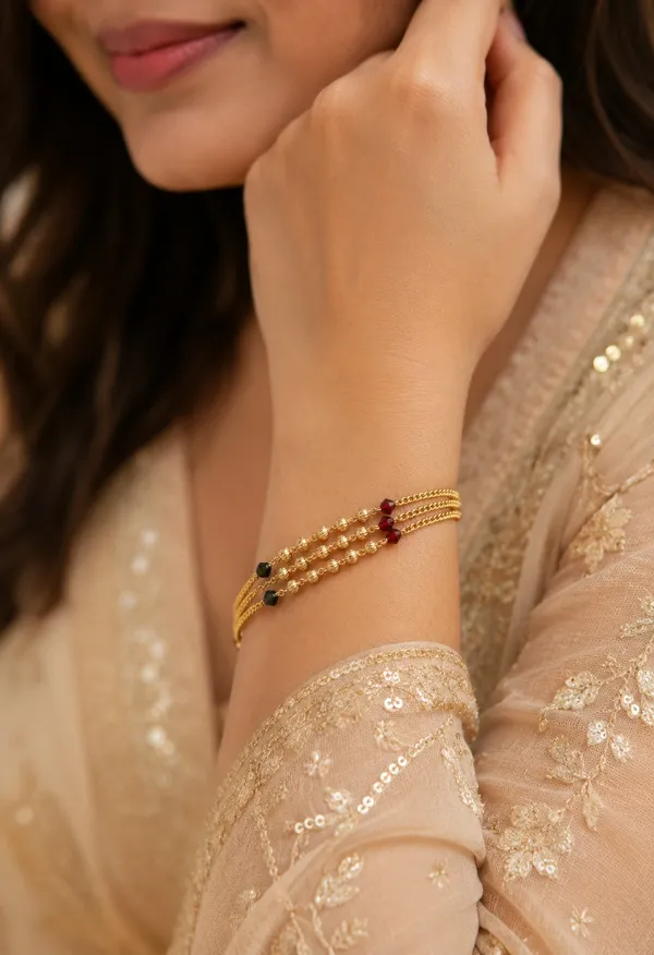 Premium_Gold-Plated_Bhabhi_Rakhi_with_Pearl_&_Ruby_Beads