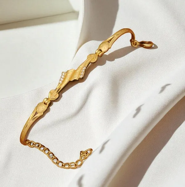 gold_plated_ad_diamond_studed_fancy_forming_bracelet