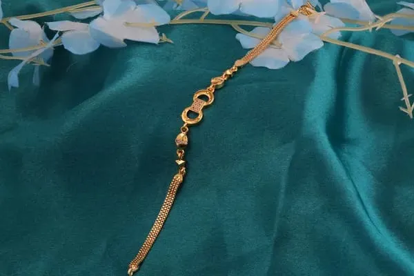 Designer_Gold_Plated_And_Diamond_Studded_Forming_Bracelet