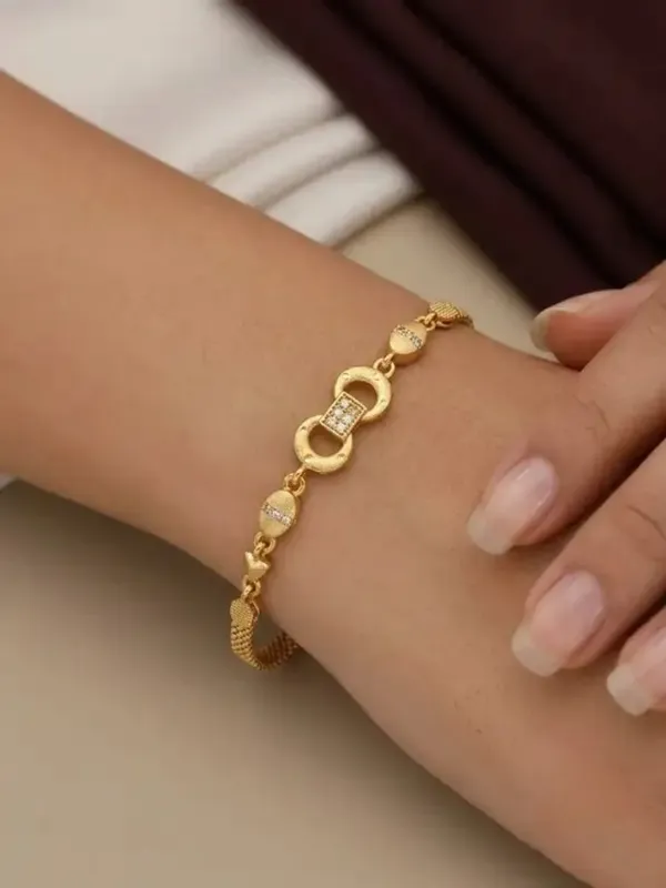 Designer_Gold_Plated_And_Diamond_Studded_Forming_Bracelet