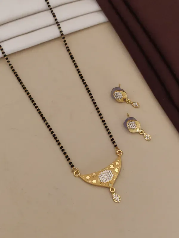 gold_plated_ad_dimaond_studed_fancy_forming_mangalsutra_with_earring