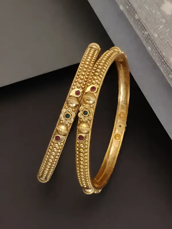 Elegant_Traditional_Daily_Wear_Gold_floral_Bangles_with_Gemstone_Detailing