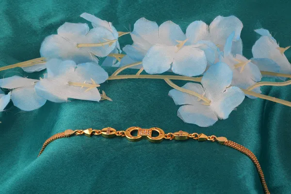 micro_gold_plated_ad_diamond_studed_fancy_infinity_baracelet