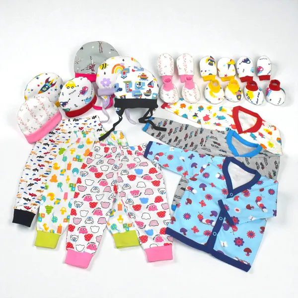 New_born_Combo_gift_set_for_baby_boy_and_girl_3_cap_mitten_booties_2_tying_cap_and_3_Fullsleeve_jabla_3_pajama_(0_-6_month)_Pink_Assorted_Design_pack_of_18