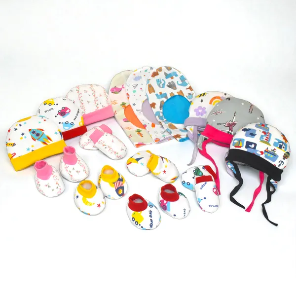 New_born_Combo_gift_set_for_baby_boy_and_girl_3_cap_mitten_booties_and_3_tying_cap_and_3_monkey_cap(0_-6_month)_Pink_Assorted_Design_pack_of_15
