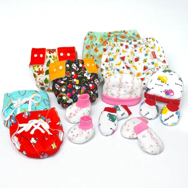 New_born_Combo_gift_set_for_baby_boy_and_girl_cap_mitten_booties_and_diapers _with_insert_and_underwears_and_nappies_(0_-6_month)_Pink_Assorted_Design_pack_of_12