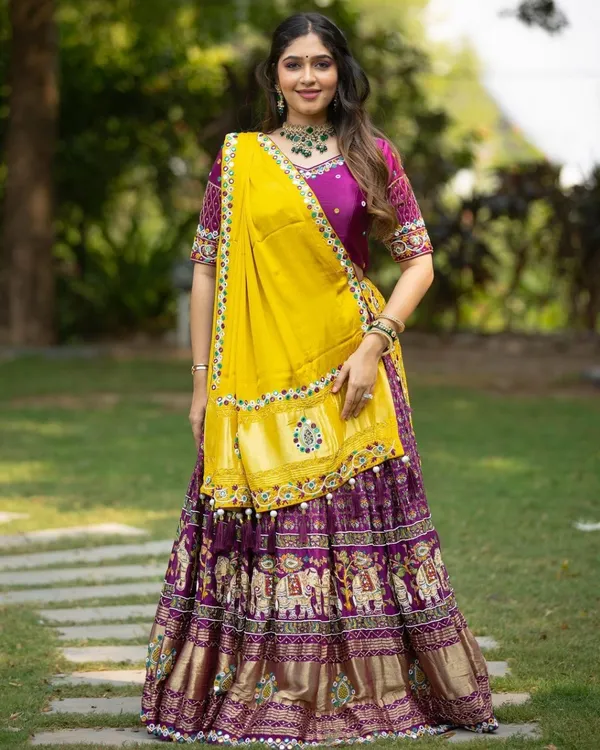Purple_Dola_Silk_Lehenga_Choli_With_Mirror_Work_And_Attached_Yellow_Dupatta