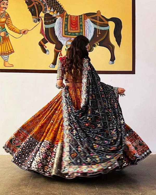 Choli_And_Lehenga_Musterd_Butter_Silk_Fabric_Multi_Dola_Silk_Lehenga_Choli_With_Mirror_Work_And_Attached_Red_Dupatta