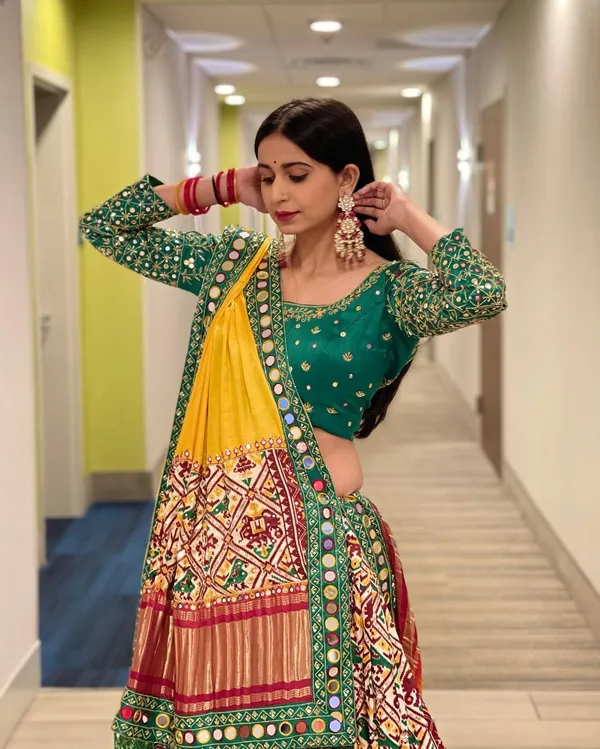 Choli_And_Lehenga_Red_Green_Butter_Silk_Fabric_Dola_Silk_Lehenga_Choli_With_Mirror_Work_And_Attached_Yellow_Dupatta