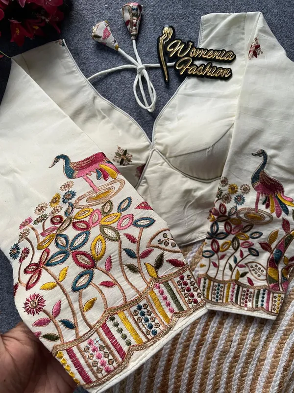 A_gracefully_detailed_blouse_inspired_by_classic_peacock_motifs_and_floral_artistry