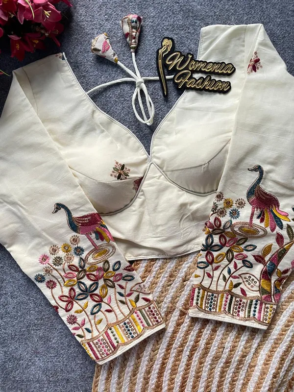A_gracefully_detailed_blouse_inspired_by_classic_peacock_motifs_and_floral_artistry