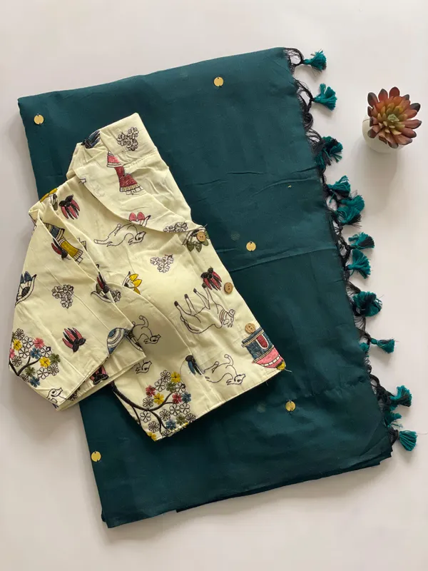 A_handcrafted_collar_blouse_paired_with_a_flowing_Khadi_saree.