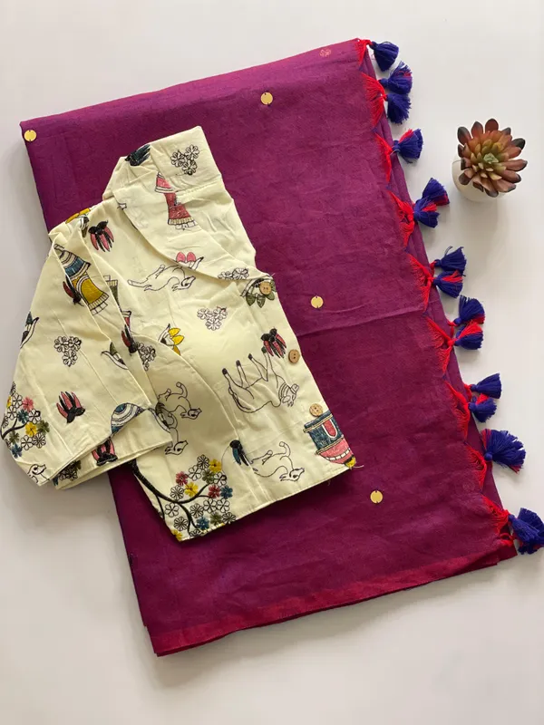 A_handcrafted_collar_blouse_paired_with_a_flowing_Khadi_saree.