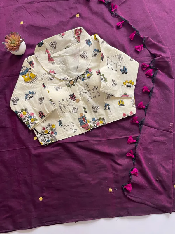 A_handcrafted_collar_blouse_paired_with_a_flowing_Khadi_saree.