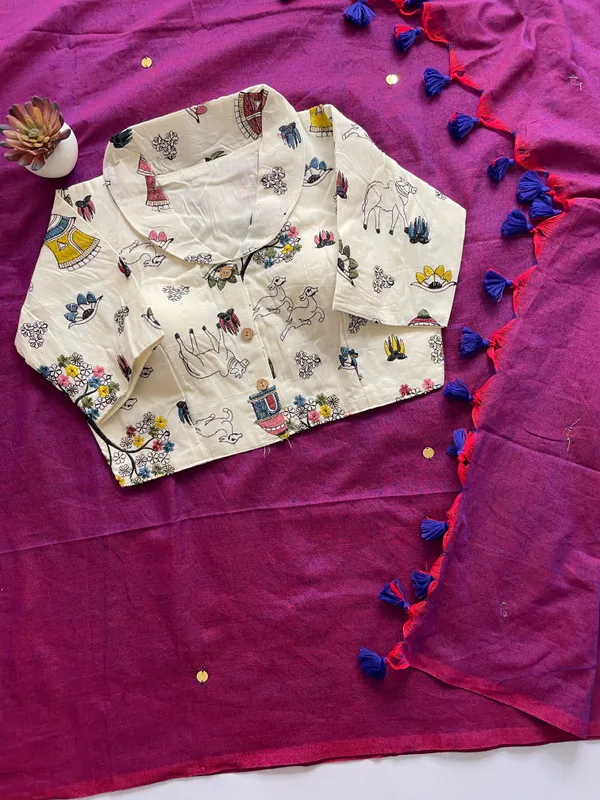 A_handcrafted_collar_blouse_paired_with_a_flowing_Khadi_saree.