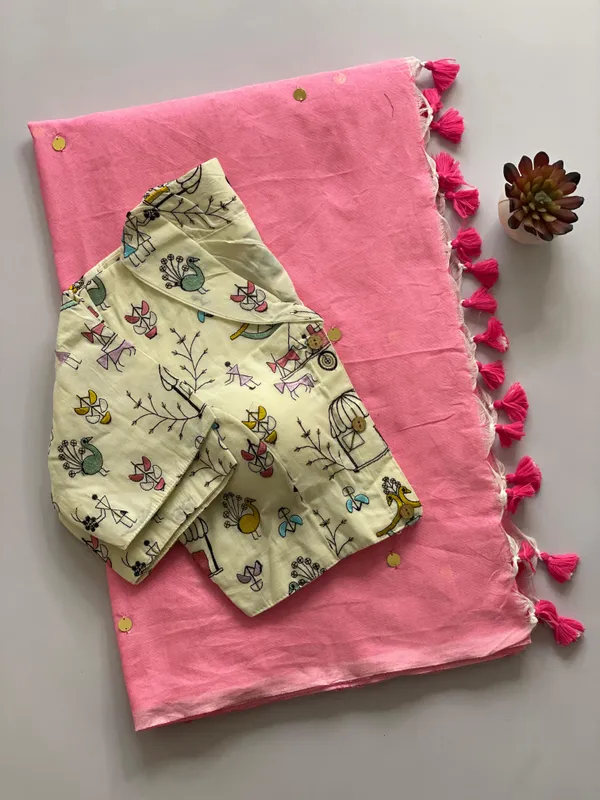 A_handcrafted_collar_blouse_paired_with_a_flowing_Khadi_saree.