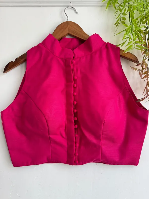 Channeling_royal_vibes_in_a_classic_high-neck_Blouse_silhouette_and_rich_crimson_tones