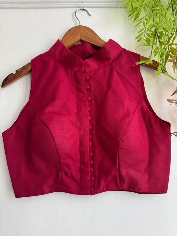 Channeling_royal_vibes_in_a_classic_high-neck_Blouse_silhouette_and_rich_crimson_tones